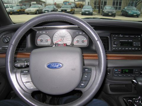 1985 Ford LTD Crown Victoria - Interior view of a Ford Crown Victoria, showing the dashboard, steering wheel, and center console.