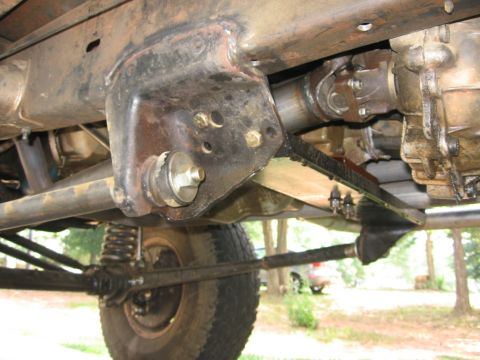 1988 Ford Bronco - The underside of a 1988 Ford Bronco reveals its suspension and drive train components.