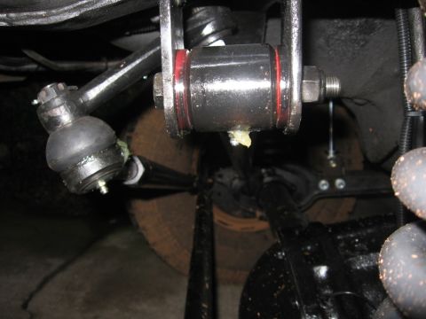 1988 Ford Bronco - Suspension part showing grease application, likely during maintenance or repair.