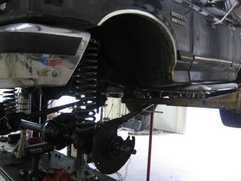 1988 Ford Bronco - The suspension system of a 1988 Ford Bronco is shown with upgraded components, indicating modifications for off-road use.