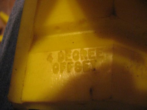 1988 Ford Bronco - A yellow automotive part is visible with the text "4 DEGREE OFFSET" stamped into it.