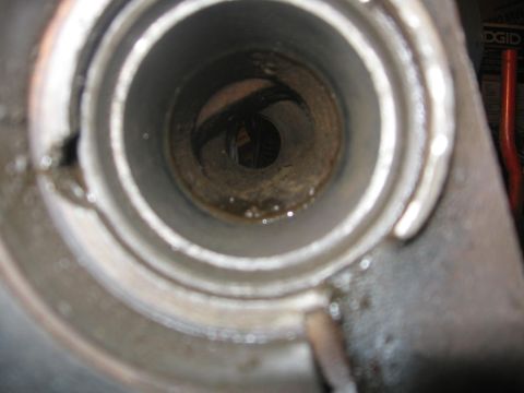 1988 Ford Bronco - Interior view of a metal pipe, possibly a component of a larger system.
