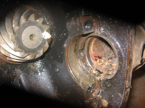 1988 Ford Bronco - This image shows a close-up of a differential gear and its housing, with visible rust and wear.