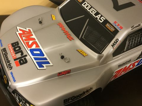 2014 Dodge 1500 - RC truck body displays various sponsor decals including AMSOIL, Borla, and BFGoodrich.