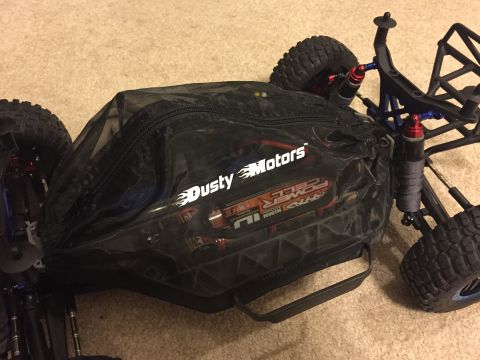 2014 Dodge 1500 - Bag of LiPo batteries for an RC car, labeled 'Dusty Motors'.