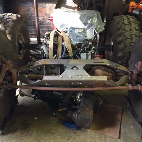 1994 Ford Bronco - Custom off-road vehicle chassis with engine and transmission components visible.
