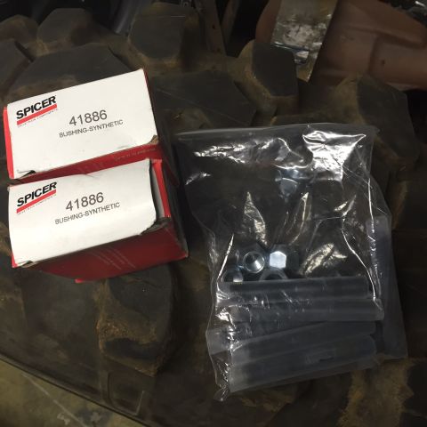 1994 Ford Bronco - Spicer 41886 synthetic bushings and hardware are shown on a tire.
