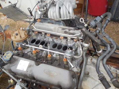 1993 Ford Bronco - The plenum & wiring came off easily, but I want to pull the distributor before the fuel rail, and clean the intake off again before pulling…