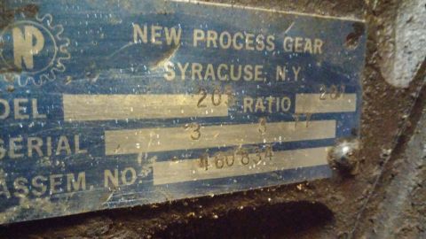 1995 Ford Bronco - A close-up of a New Process Gear data plate, indicating a 20:1 ratio and serial number 460834.
