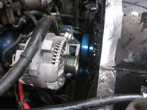 1988 Ford Bronco - Alternator and pulley system detail, likely from an engine bay.