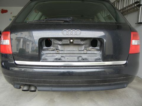 2003 Audi A6 - Rear view of a 2003 Audi A6 wagon, showing the exhaust and the area where the license plate would be mounted.