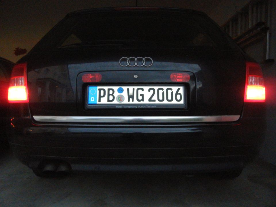 Black Audi wagon rear view, license plate PB WG 2006