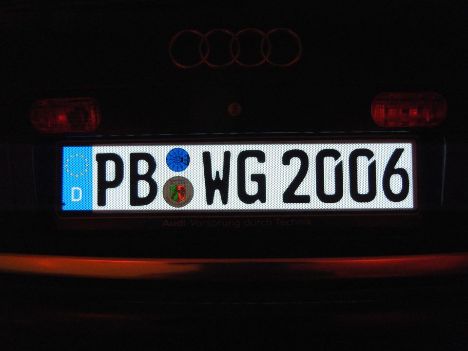 Rear of an Audi showing the license plate PB WG 2006 and the four rings emblem