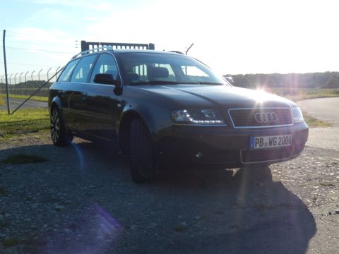 2003 Audi A6 - This Audi A6 Avant wagon is seen from the front-right angle under a bright sky.