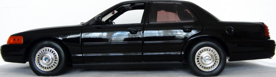 Black 2003 Mercury Marauder side view