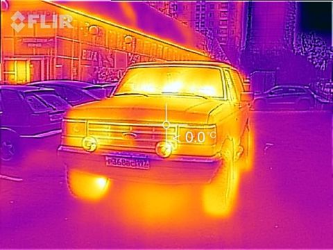 1987 Ford Bronco - Thermal image captures the front of a 1987 Ford Bronco, showing its heat signature.