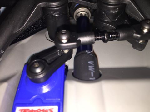 2014 Dodge 1500 - This image shows the steering servo and linkage assembly of a remote-controlled car.