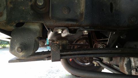 1991 Ford F-250 - Undercarriage view showing suspension components and chassis structure.