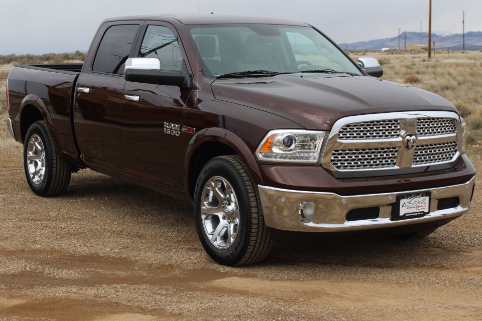 Brown 2015 Dodge 1500 pickup truck, 3q-front view