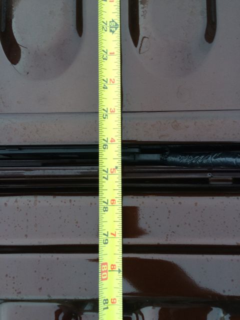 2015 Dodge 1500 - Measuring tape is shown against a dark surface, with markings up to 81 inches.