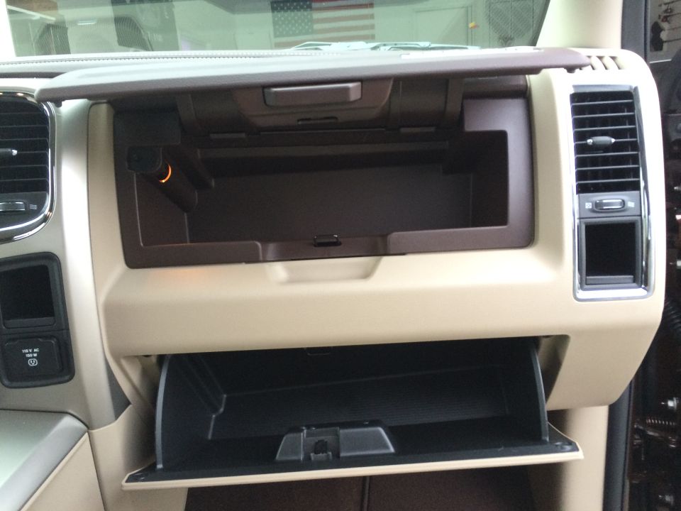 Interior view of open glove boxes in a 2015 Dodge 1500