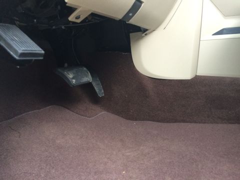 2015 Dodge 1500 - View of the driver's side footwell, showing the accelerator and brake pedals.