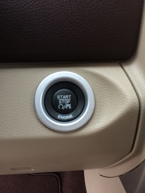 2015 Dodge 1500 - Interior view of a 2015 Dodge 1500's push-to-start button.