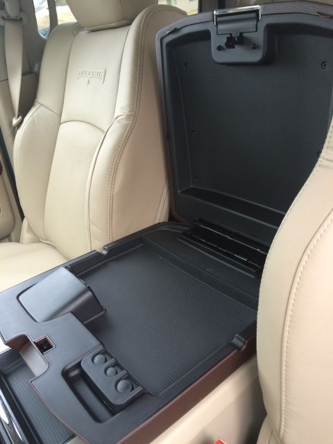 2015 Dodge 1500 - Interior view of a vehicle's center console and seating area.
