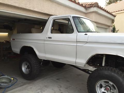 1979 Ford Bronco - This 1978 Ford Bronco is shown from the side in a garage setting.