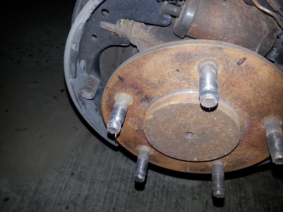 Found a cross threaded wheel stud on my 8.8. Not sure if I did this, or if it was the shop that put the tires on. anyway, this is an easy repair.

Tools/parts needed
1 - Dorman AutoGrade - Wheel Stud -Part # 610-260 ($1.99)
5 lb sledge hammer
Impact gun or large breaker bar
4 or 5 thick washers
grease