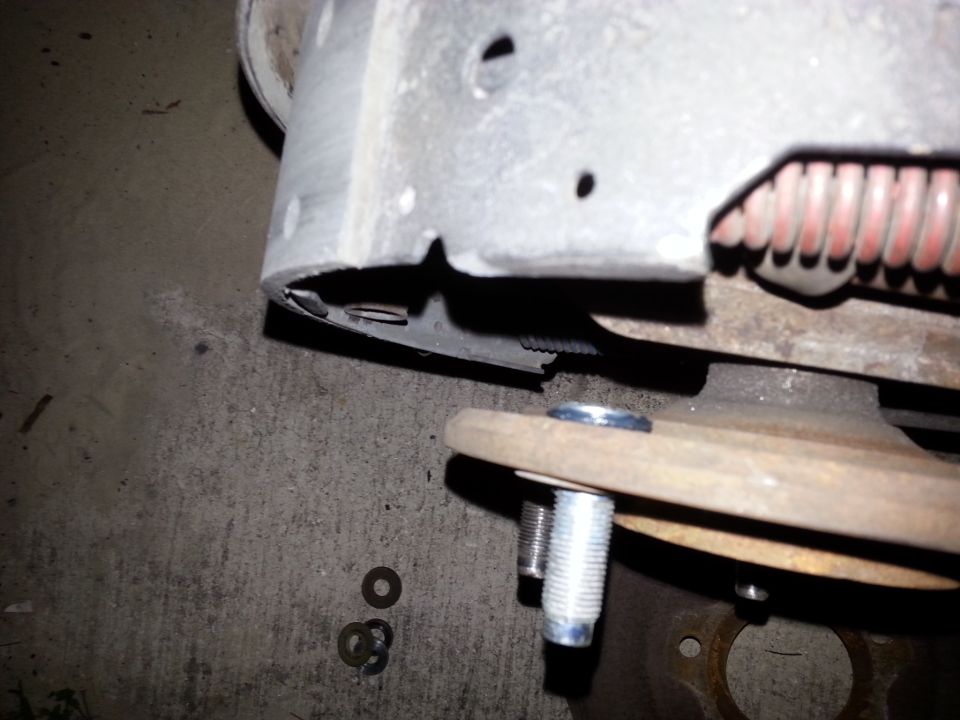 Wheel stud and brake drum assembly with washers on concrete