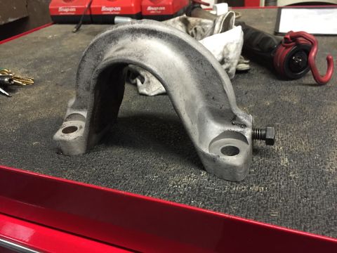 1994 Ford Bronco - Close-up of a driveshaft support bearing, likely removed for repair or replacement.