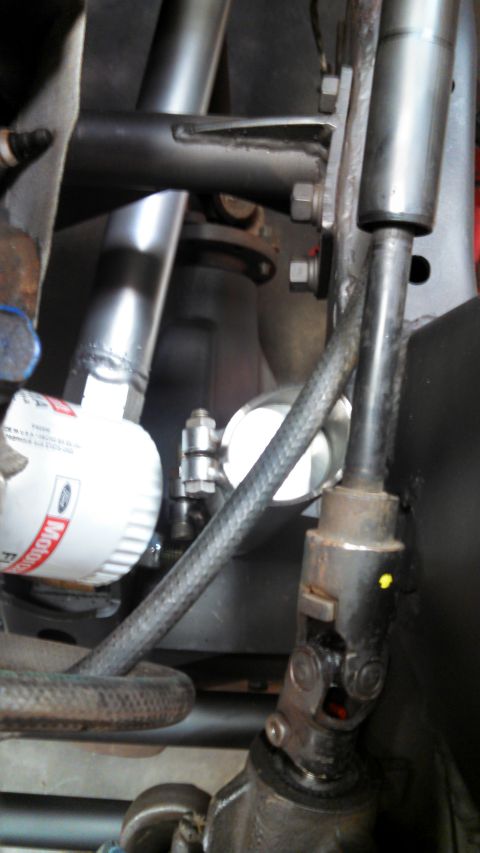 1967 Ford F-250 - Close-up view of the steering column and a Motorcraft oil filter on a 1967 Ford F-250.