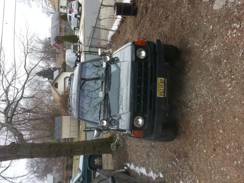 1987 Toyota 4Runner - This 1987 Toyota 4Runner is seen from the front, aftermarket lights and a yellow license plate.