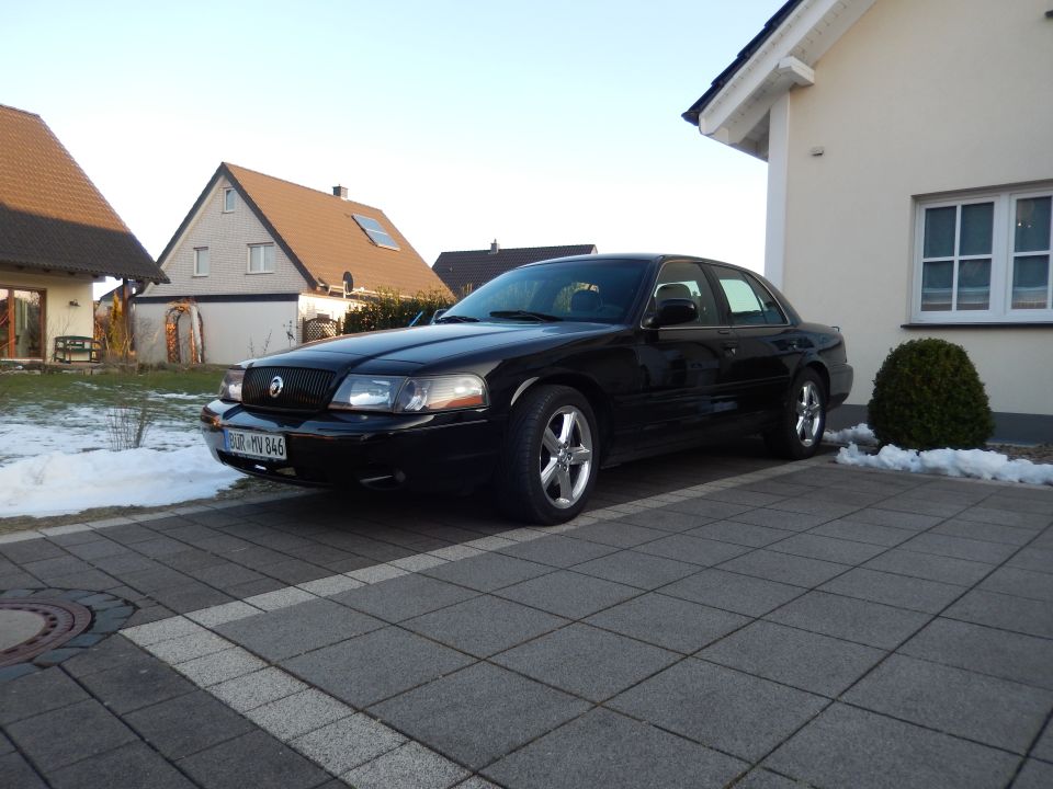 Black 2003 Mercury Marauder parked in driveway
