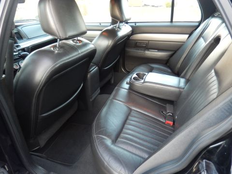 2003 Mercury Marauder - Interior view of the rear seats and center console in a 2003 Mercury Marauder.