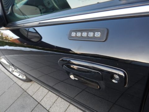 2003 Mercury Marauder - Close-up of a black car door showing the keypad entry and chrome door handle.