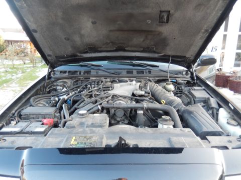 2003 Mercury Marauder - The engine bay of a 2003 Mercury Marauder, showing the V8 engine and associated components.
