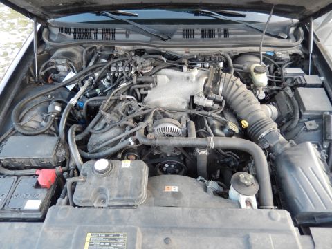 2003 Mercury Marauder - Engine bay of a vehicle, showing the V8 engine and associated components.