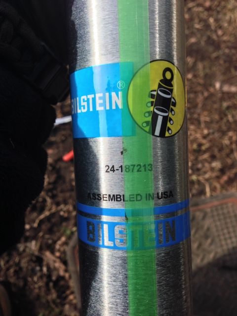 1979 Ford Bronco - Close-up of a Bilstein shock absorber, showing its branding and part number.