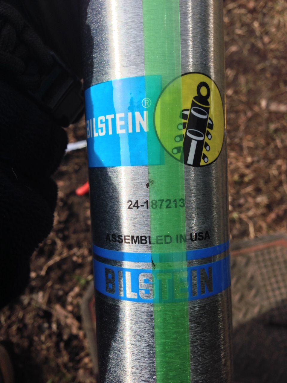 Bilstein shock absorber with part number 24-187213 and "Assembled in USA" text