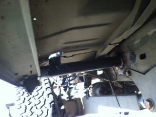 1995 Ford Bronco - The underside of a vehicle is shown, with a prominent Supermotors watermark visible.