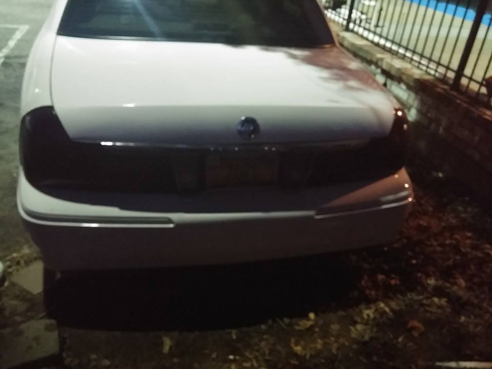 White 2000 Mercury Grand Marquis rear bumper and taillights