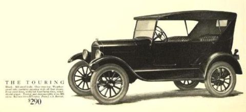 1909 Ford Model T - This touring car, advertised for $290, features a black, all-steel body and a one-man top.