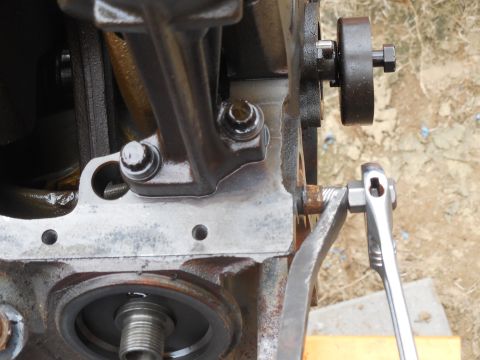 1993 Ford Bronco - One timing cover bolt sleeve stayed in the block; the other in the timing cover. I extracted both so I could be sure the surfaces were clea…