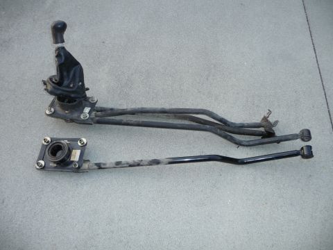 1993 Mazda MX-3 - This is a manual transmission shift linkage assembly, likely from a car's interior.