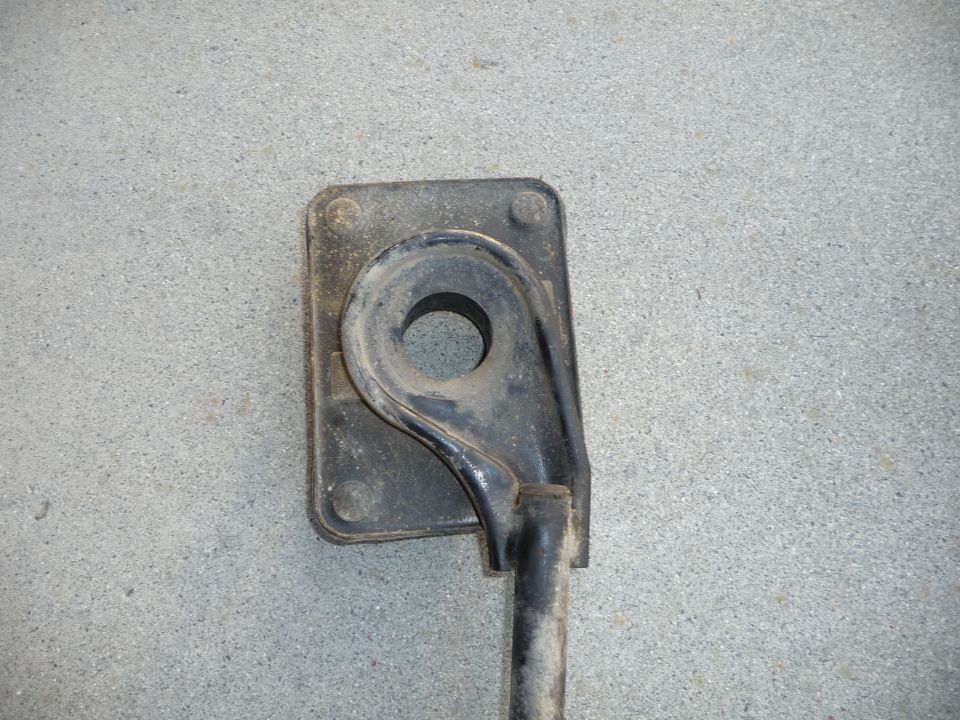 Black suspension part with a circular opening and mounting plate