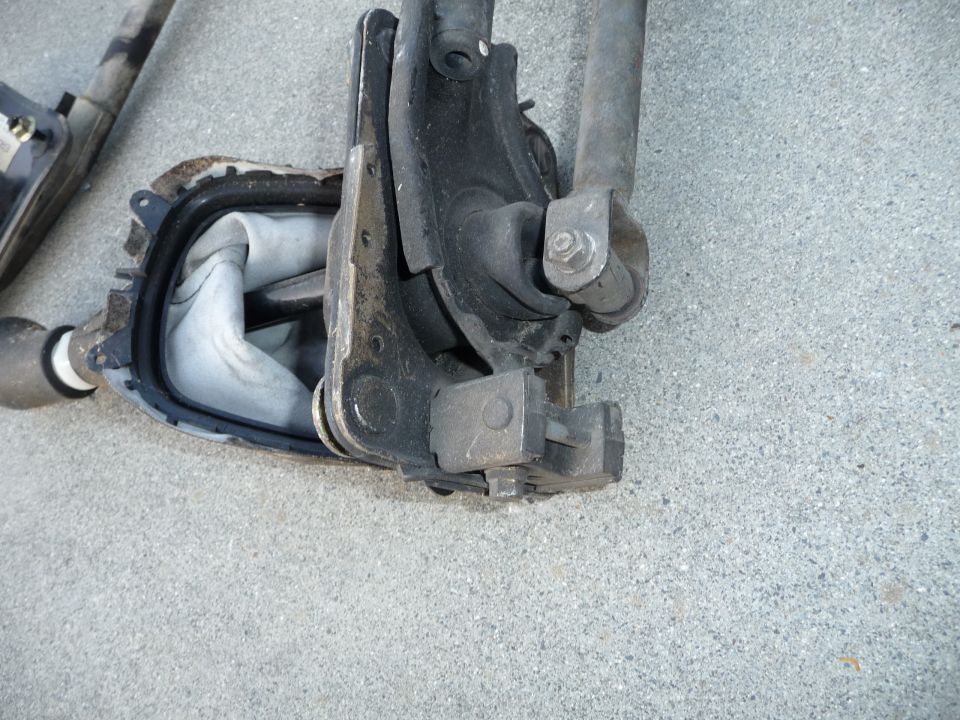Gear shifter assembly with rubber boot