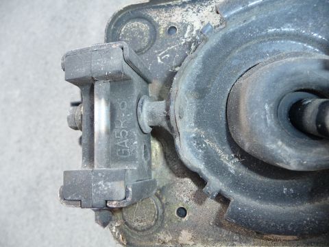 1993 Mazda MX-3 - Close-up of a vehicle suspension component showing the marking GA5R-8.