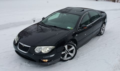2002 Chrysler 300M - Black 2002 Chrysler 300M in snowy conditions.